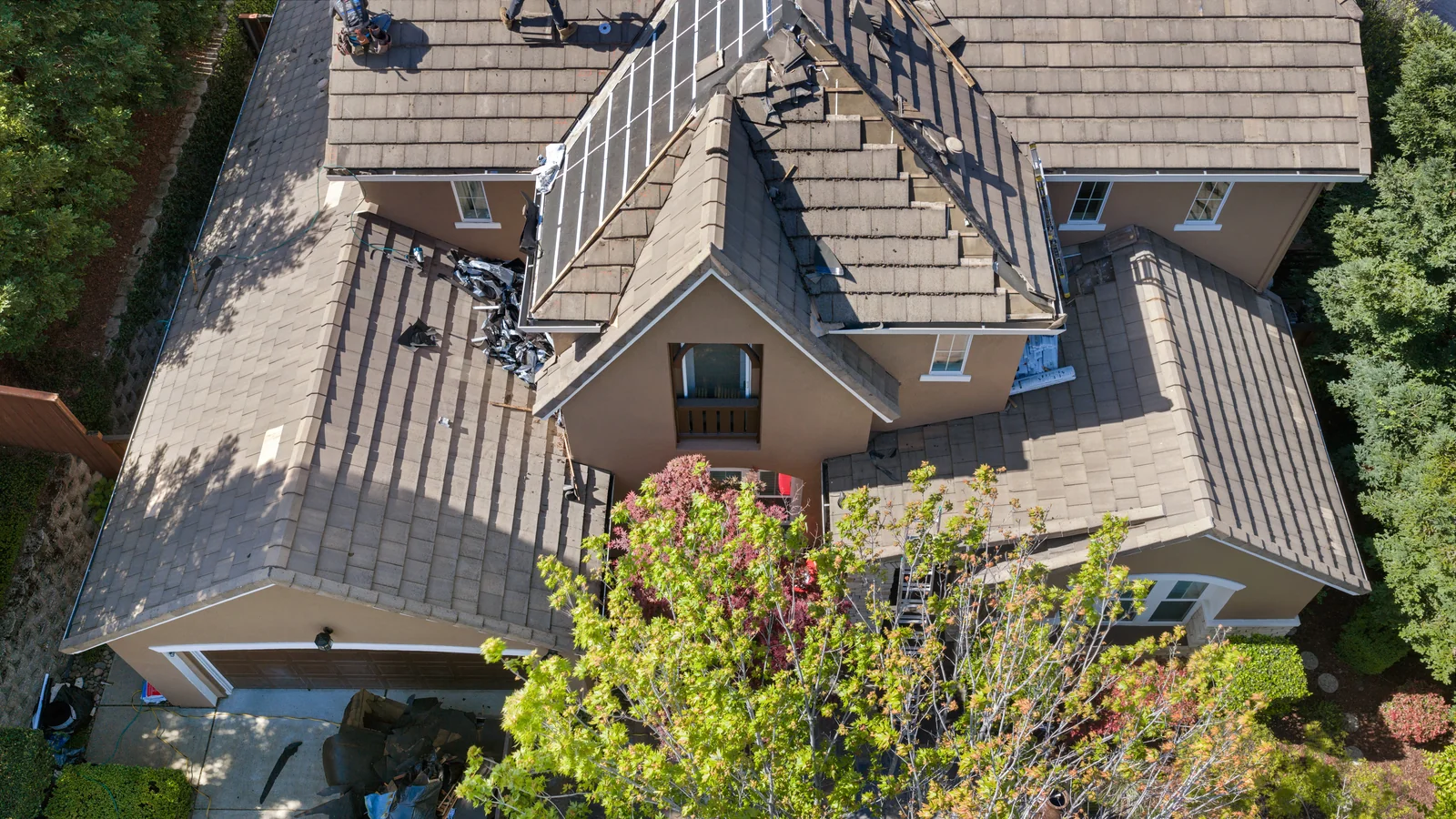 Completed roofing project in a foothills neighborhood showing clean lines and finished exterior work